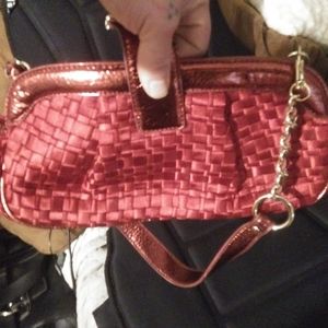 Red evening purse by the sak
